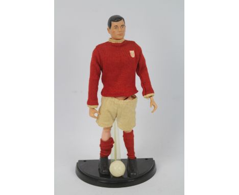 Palitoy - Action Man - A vintage unboxed Palitoy Action Man Footballer figure. The black painted head, hard hand figure appea
