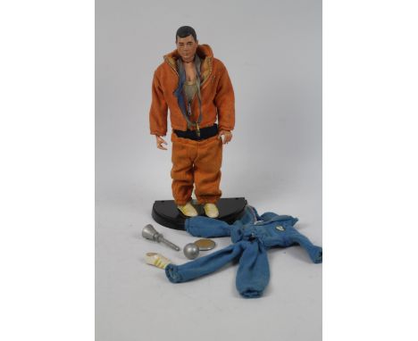 Palitoy - Action Man - A vintage unboxed Palitoy Action Man Olympic Champion figure. The black painted head, hard hand figure