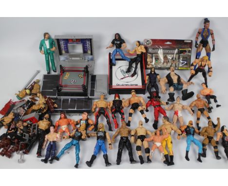 WWE -  Hasbro - Vivid Imaginations. In excess of 20 loose figures ranging from 1991 to modern times in varying scales to incl