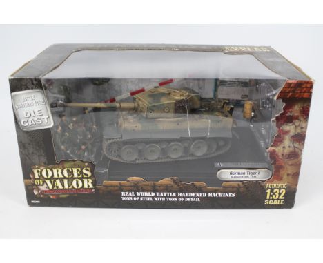Forces Of Valor - A boxed 1:32 scale German Tiger I Tank, Eastern Front 1944 # 80404. The model appears Mint with accessories