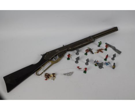 Toy Gun - An unmarked 1950's pressed steel Winchester style cork firing gun. The vintage gun in the style of a 'Daisy' appear