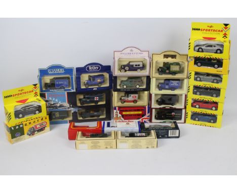 Lledo - Maisto. In excess of 20 boxed die cast models, appearing in excellent condition to feature: Maisto Ferrari 348ts. Lle
