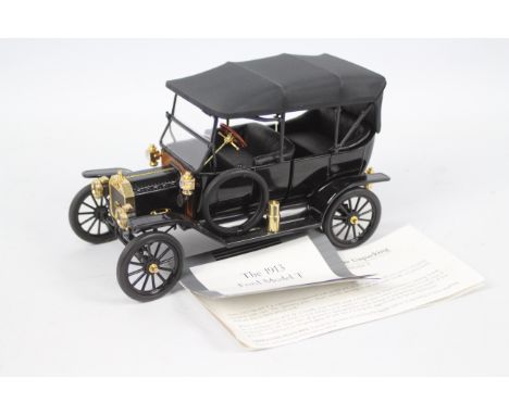 Franklin Mint - A 1:16 scale 1913 Ford Model T. The car appears Mint in its original polystyrene packaging but there is no ou