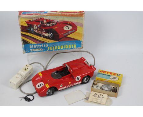 Rare Vintage Remote Control Alfa Romeo - AMB Italy. An AMB Italy remote control Alfa Romo 33P #774. Item is boxed with scuffi