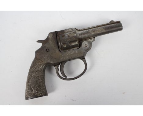 Kilgore - A rare, unboxed Kilgore 'Premier Safety' cap gun. The cast iron made cap gun, is date stamped to one side 'Pat Dec 