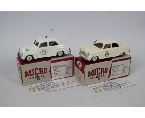 Micro Models - 2 x boxed limited edition Police cars in 1:43 scale, a Ford Zephyr in Queensland Police livery # MM409 and a H