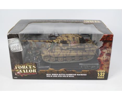 Forces Of Valor - A boxed 1:32 scale German King Tiger Tank number 333, Germany 1944 # 80501. The model appears Mint in a Fai