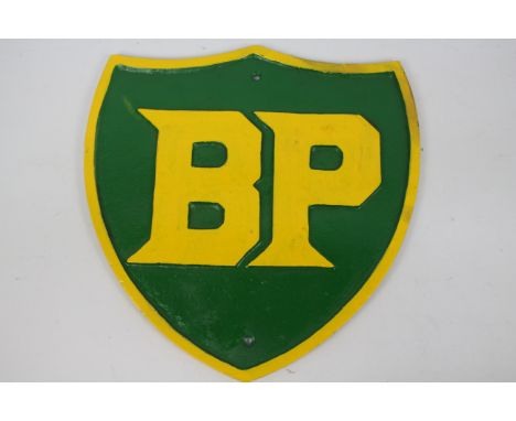 A large cast iron wall plaque marked BP, approximately 34 cm x 33 cm. YBPL