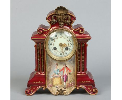 A 19th century French Sevres style mantel clock. Claret ground, with gilt metal mounts and painted with a Watteauesque scene.