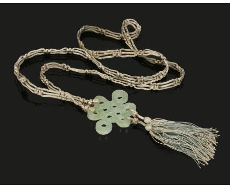 A Chinese carved celadon jade knot pendant, 5cm wide.  Condition Report. To be used as a guide only. Good condition. 