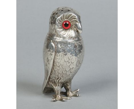 A Victorian novelty silver pepper pot by Henry Wilkinson & Co. Modelled in the form of an owl, with textured feather detail a