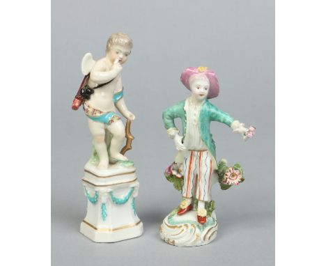 A rare Chelsea Derby Neo-Classical figure of Cupid holding a bow and arrow and raised on a plinth along with a Derby figure o