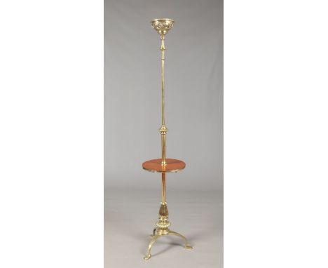 A Victorian brass and mahogany rise and fall lamp standard for an oil lamp. Raised on a fluted baluster centre pedestal over 