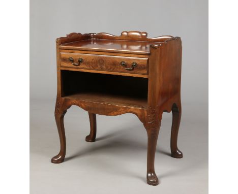 Manner of Robert Lorimer, an Arts and crafts Whytock & Reid mahogany single drawer side table. With scrolling gallery top, ca