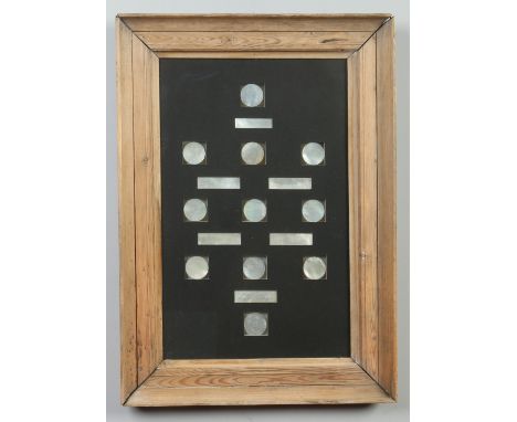 Seventeen framed Cantonese mother of pearl gaming counters. 