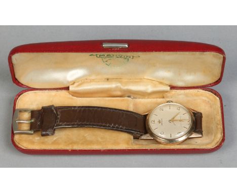 A gentleman's 9 carat gold cased Marvin manual presentation wristwatch in original box. With satin dial, applied markers and 