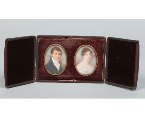 A pair of early 19th century cased ivory portrait miniatures. Portraits of a lady and gent. The case inscribed in gilt letter