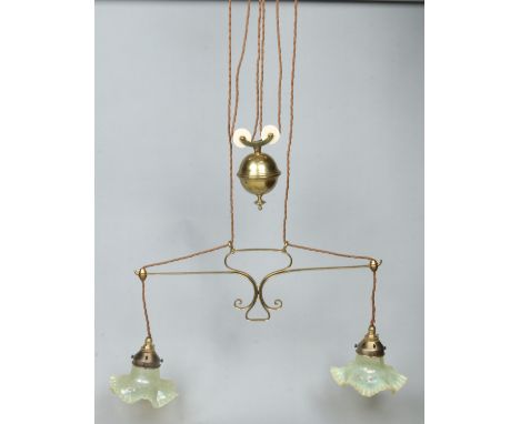 A pair of Victorian Benson style brass twin branch rise and fall ceiling lights each with vaseline glass shades, 55.5cm wide.
