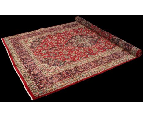 A hand woven Persian Kashan wool carpet. With a centre medallion and trailing floral border, 1m 90cm wide, 2m 80cm long. Cond