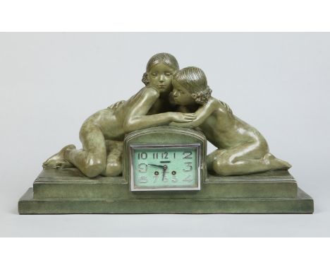 A French Art Deco verdigris terracotta figural eight day mantel clock striking on a bell. Surmounted by two nymphs huddled ar