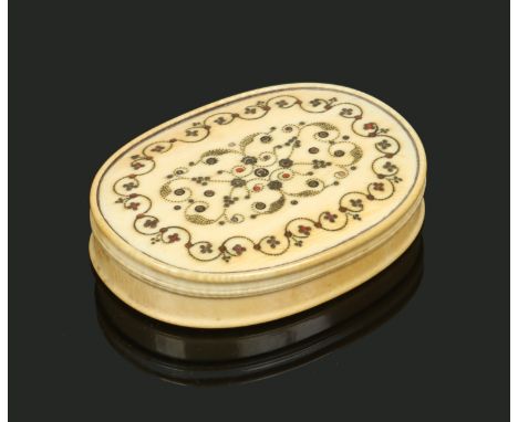 An 18th century ivory ovoid snuff box and cover. With piquet inlay and painted to the inner cover with the portrait of a maid