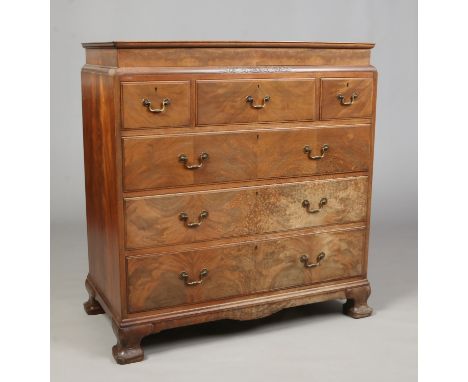 Manner of Robert Lorimer, an Arts & Crafts Whytock & Reid mahogany tallboy. Carved in light relief with stylized foliage, wit
