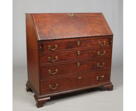 A George III mahogany bureau with fitted interior, oak drawer linings and raised on ogee bracket feet, 1m 9cm high, 1m 4cm wi