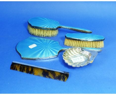 A four-piece silver and guilloche enamel Dressing Table set, hallmarked Birmingham, 1941, comprising a hand mirror, hair brus