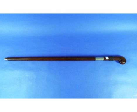 An antique split-cane Sword Stick, probably Asian, with silvered mounts and pistol handle, the 23½in (59.5cm) steel blade wit