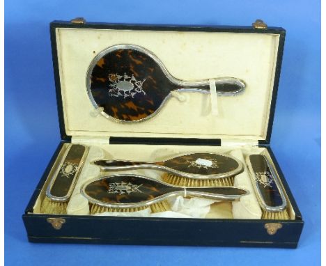 A George V five-piece silver and tortoiseshell Toilet Set, by Levi & Salaman, hallmarked Birmingham, 1918, with silver overla