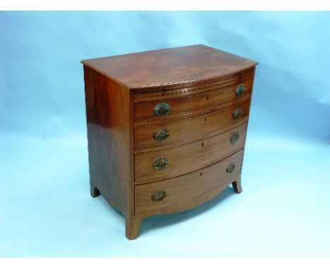 A 19thC mahogany bow-front Chest of Drawers, the shaped top with moulded edge above a slide and four long graduated drawers, 