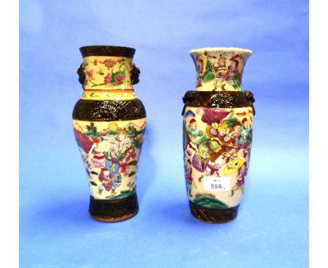 A Canton famille rose porcelain Vase, applied with mask ring handles, moulded floral border, enamelled with warriors, the foo