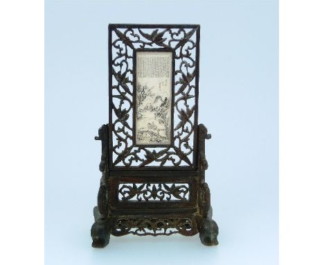 An early 20thC small Chinese Screen, the rectangular ivory plaque engraved and stained with a figures in an interior and hors