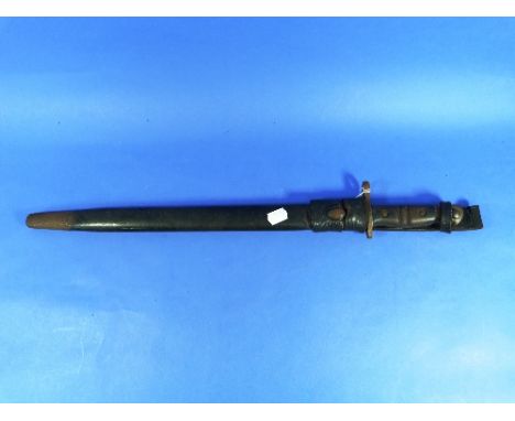 A British 1907 Pattern Bayonet, with leather scabbard and frog. THIS LOT WILL BE SOLD ON FRIDAY 11TH SEPTEMBER STARTING AT 2P