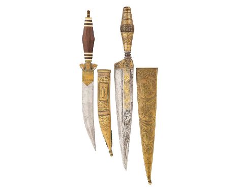 A SPANISH DAGGER AND A FURTHER DAGGER FROM SIERRA LEONE, 19TH CENTURY the first with single edged blade with false edge runni