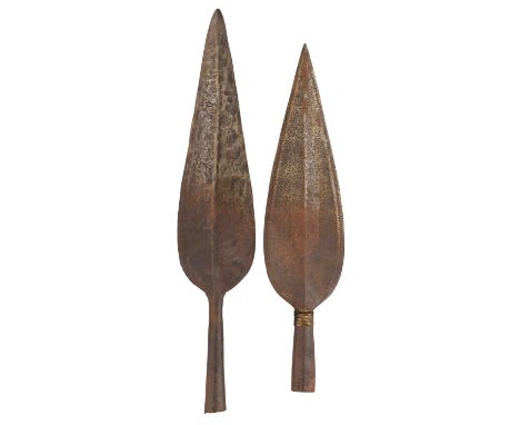 TWO SUDANESE SPEARHEADS, 19TH CENTURY the first with broad leaf-shaped blade of hollow-ground diamond section and copper allo