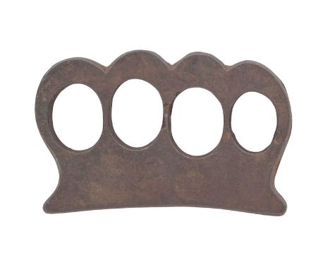 A SOUTH INDIAN KNUCKLE PUNCH (VAJRA MUSHTI), 19TH CENTURY, POSSIBLY KERALA formed of a single piece of iron, four holes for t