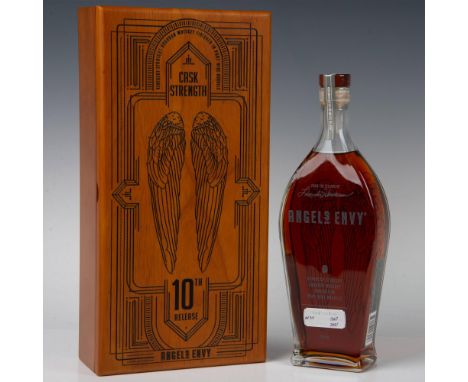 Angel's Envy Kentucky Straight Bourbon, finished in Ruby Port Wine barrels with batch number C10, is presented in a tapered g