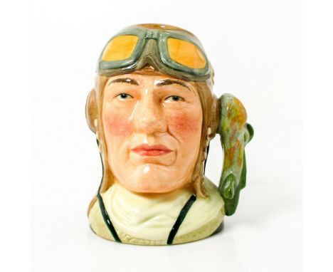 Style One, Variation One. Light brown cap; dark brown flight jacket with cream collar; white scarf without cypher.This series