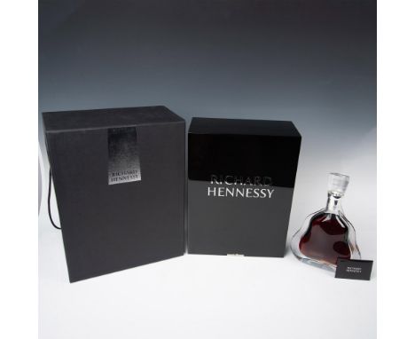 Sealed Baccarat crystal decanter from France with silver stopper containing fine Richard Hennessy Cognac, marked JA Hennessy 