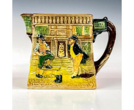 A glazed porcelain pitcher with high relief images of characters and settings from The Pickwick Papers novel. Royal Doulton b