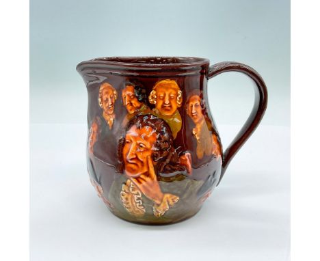 A brown glazed pitcher featuring a man lost in thought and surrounded by friends. Royal Doulton backstamp. Issued: 20th centu