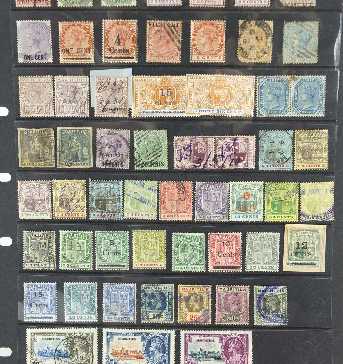 Sheet of Mauritius stamps, some with ink inscriptions, various ...