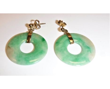 A pair of modern jade and yellow metal mounted disc earrings - diameter of disc approx. 2.6 cm