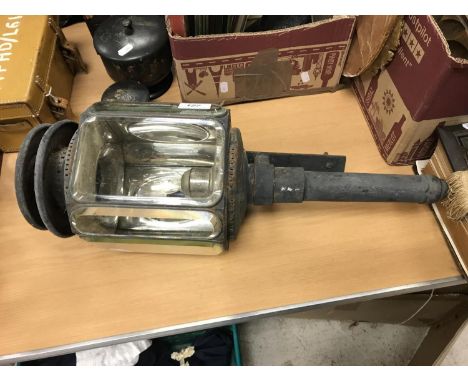 A carriage lantern with bevelled glass and incised silver plated bulb holder, inscribed "Davis, 7 Hart Street Grosvenor Squar