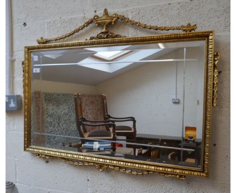 Ornate gilt framed bevelled glass mirror 