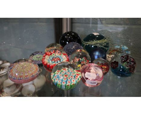 Collection of glass paperweights to include Caithness 