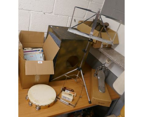 Collection of musical equipment to include ukulele, a caj¢n (Irish drum box), harmonica and harmonica books etc 