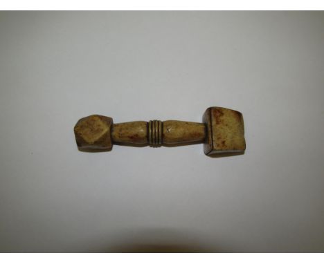 A 19th Century carved bone tool possibly for leather working 