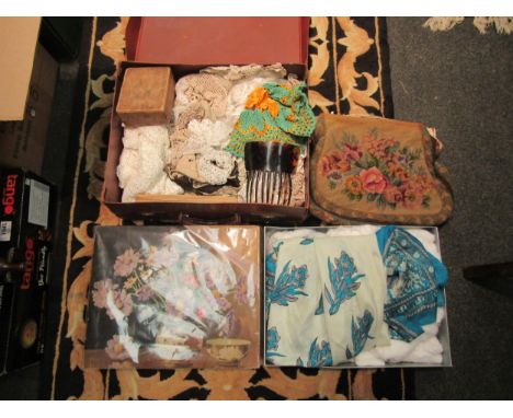 A vintage suitcase with contents including lace oddments, tapestry bag, wooden fans, silk scarf, tortoiseshell hair comb, Mur